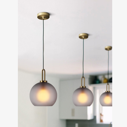 Globe and Capsule Glass Pendant Light with Brass Arch - Modern Style
