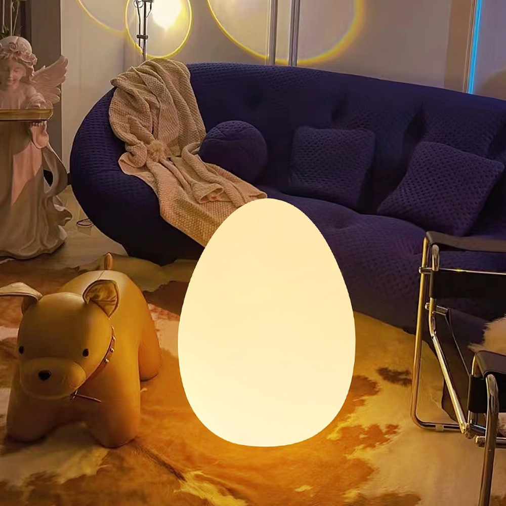 LED Floor Lamp with Sculptural Oval Egg Profile and Molded Plastic Shell