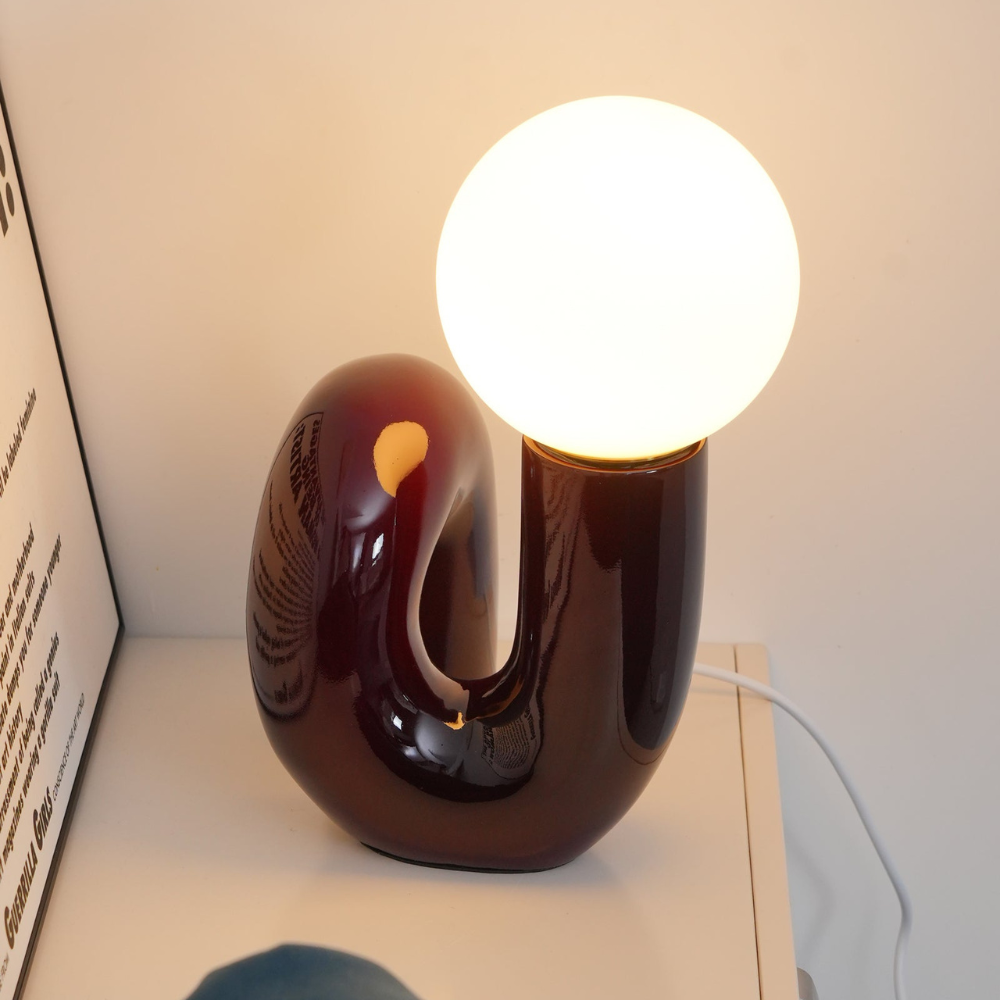 Curved Resin Accent Lamp with White Globe - Playful Contemporary Decor