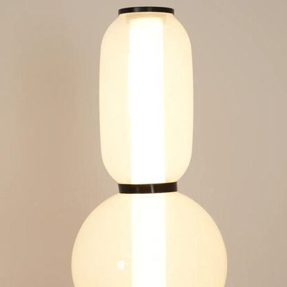 Modern LED Floor Lamp with Stacked Blown Glass Pebbles and Slender Metal Post