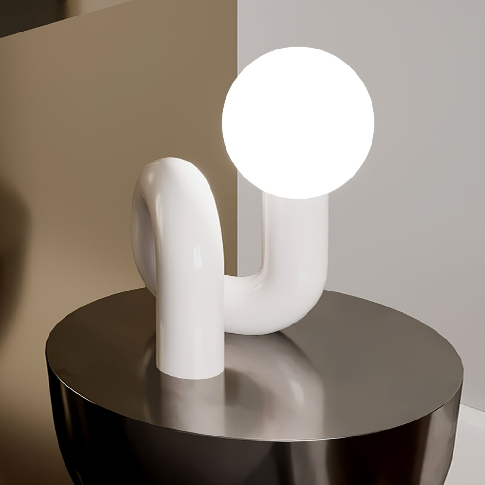 Curved Resin Accent Lamp with White Globe - Playful Contemporary Decor