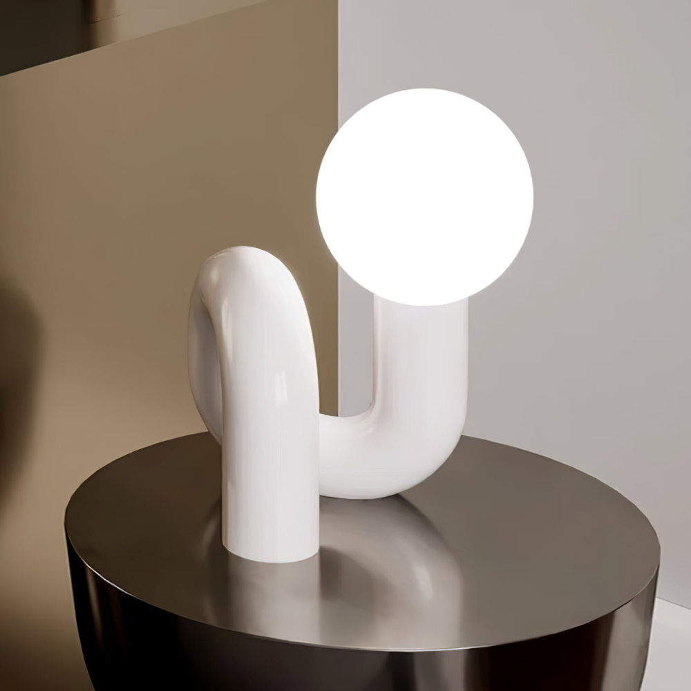 Curved Resin Accent Lamp with White Globe - Playful Contemporary Decor