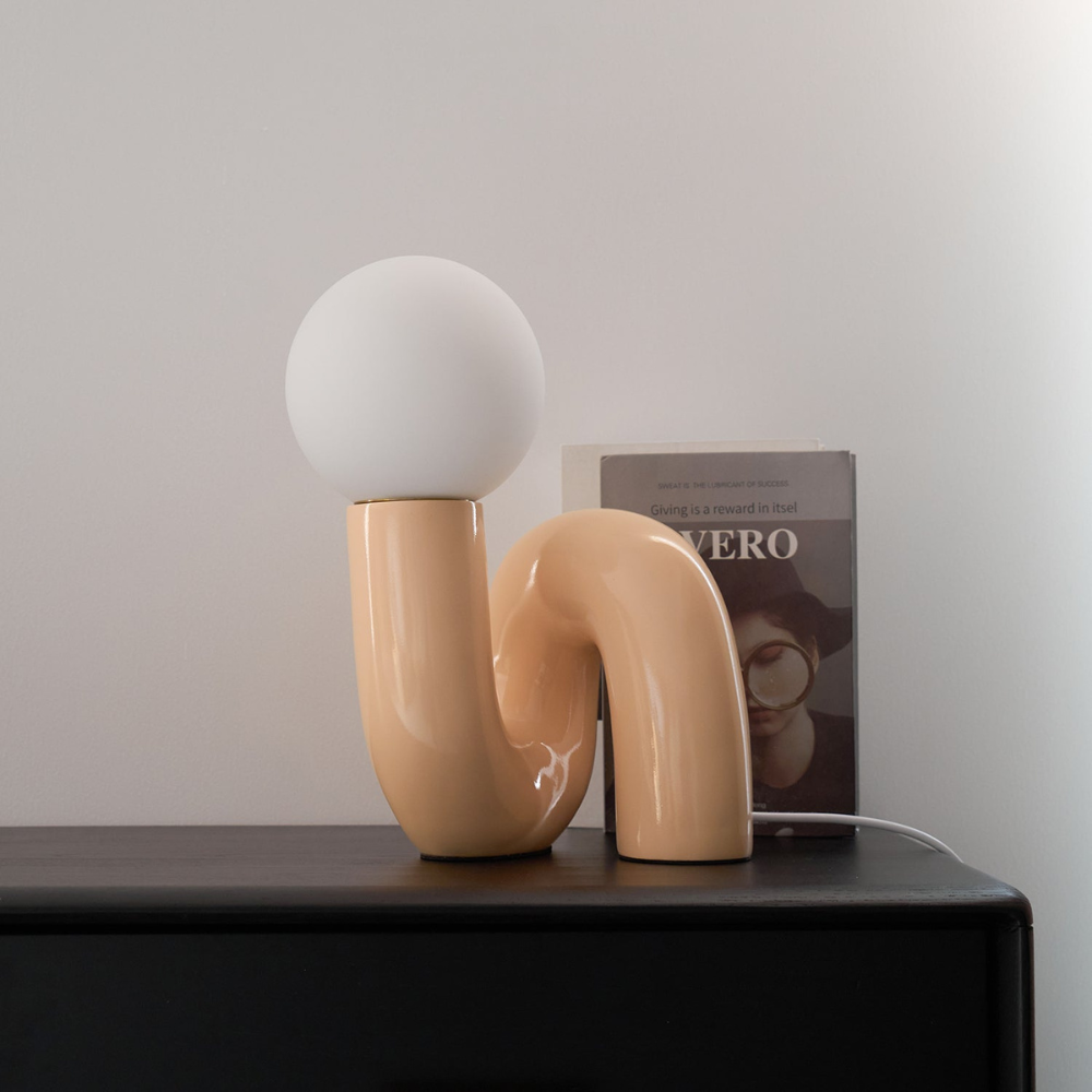 Curved Resin Accent Lamp with White Globe - Playful Contemporary Decor
