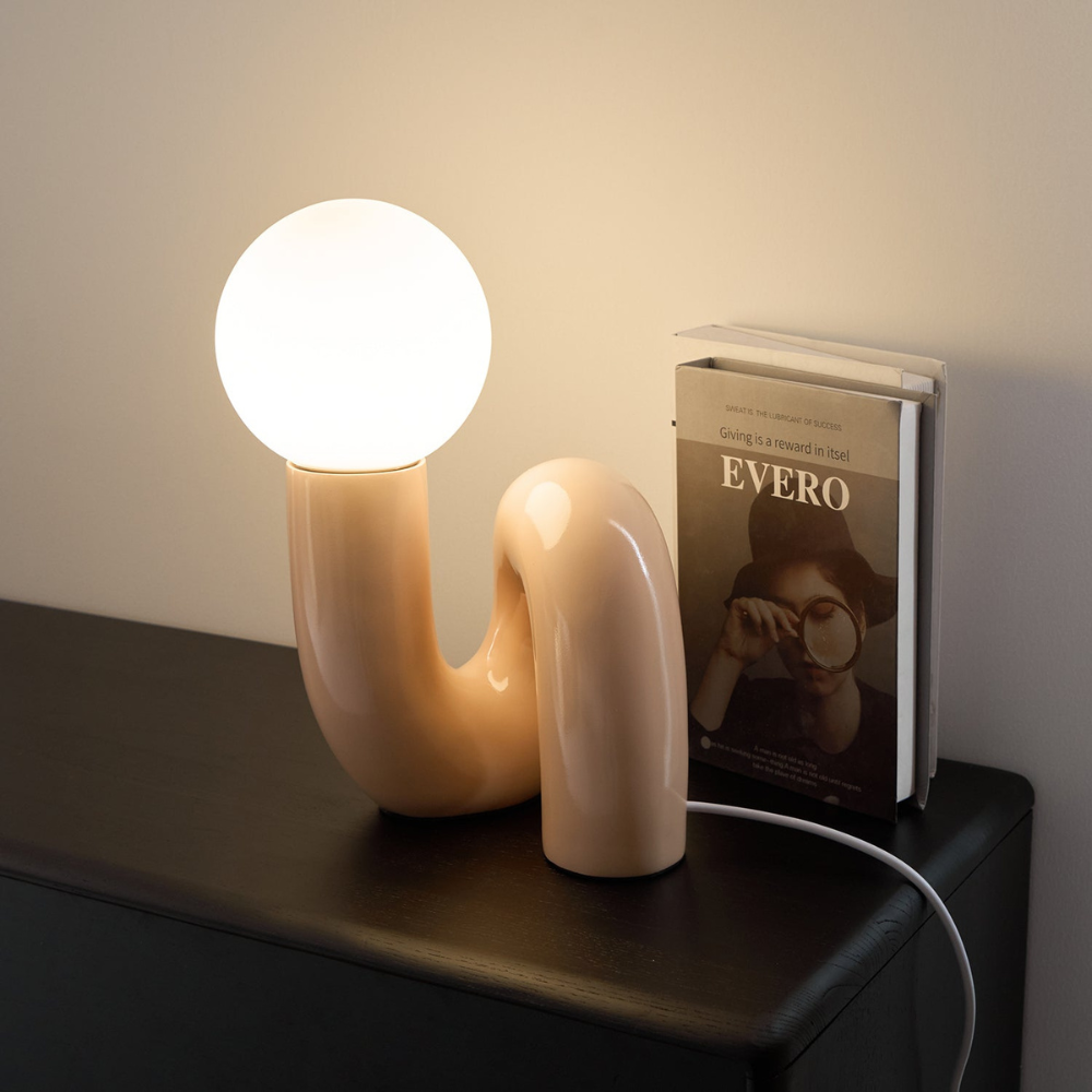 Curved Resin Accent Lamp with White Globe - Playful Contemporary Decor