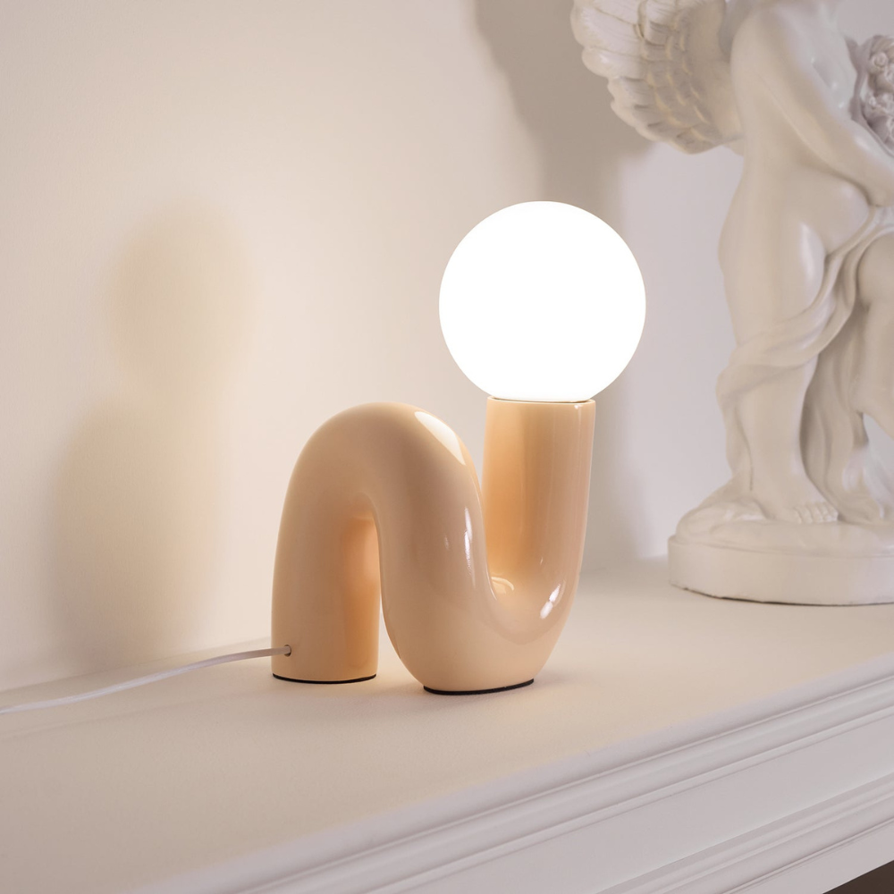 Curved Resin Accent Lamp with White Globe - Playful Contemporary Decor