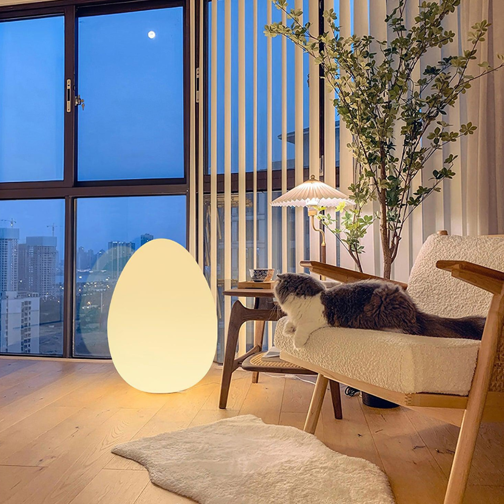 LED Floor Lamp with Sculptural Oval Egg Profile and Molded Plastic Shell