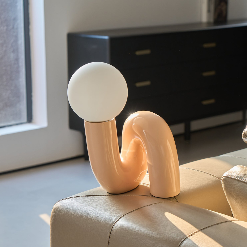Curved Resin Accent Lamp with White Globe - Playful Contemporary Decor