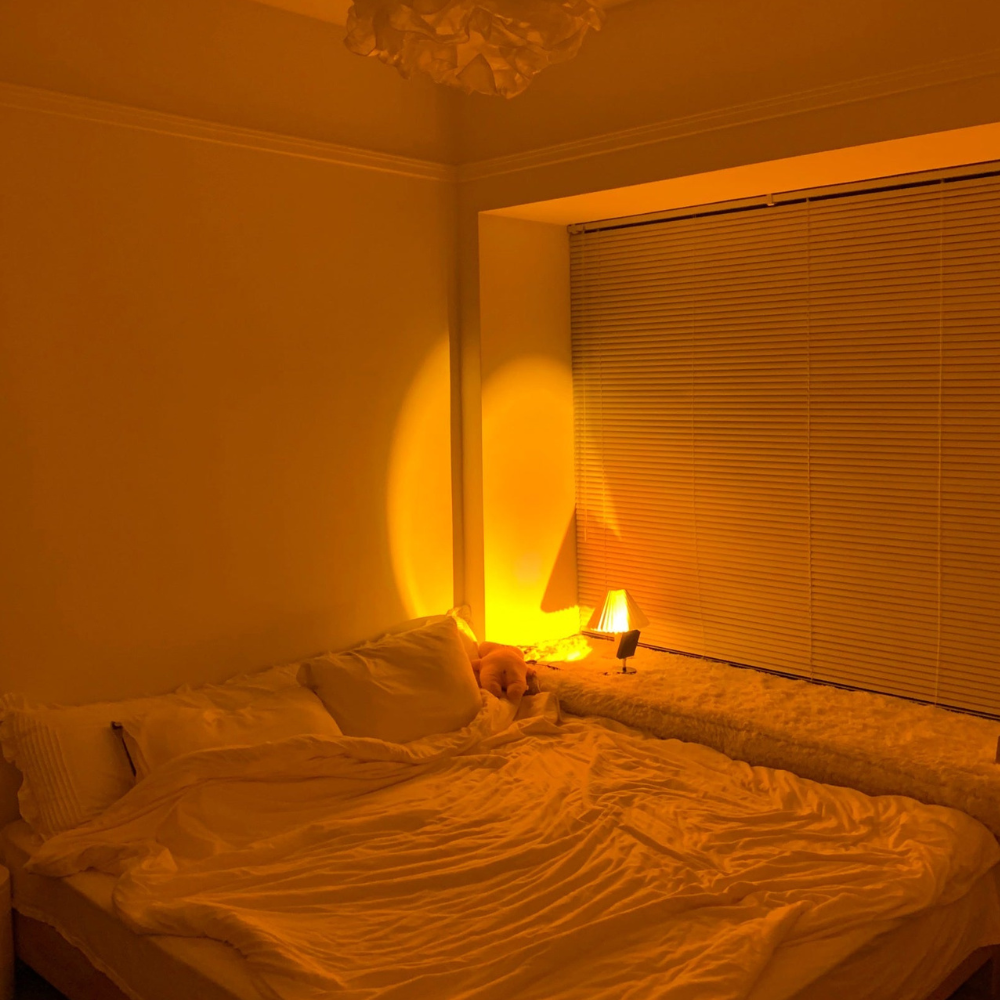 Moderne Sonnenuntergang-Projektorlampe – Architektonisches Halo-Stimmungslicht für Fotografie