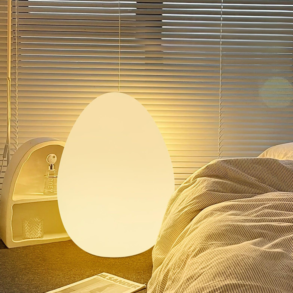 LED Floor Lamp with Sculptural Oval Egg Profile and Molded Plastic Shell